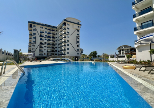 Faralya Residence - 1-værelses lejlighed til salg i Payallar